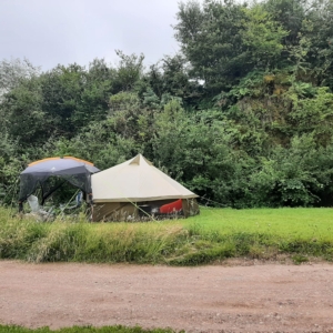 pitched tent with gazebo